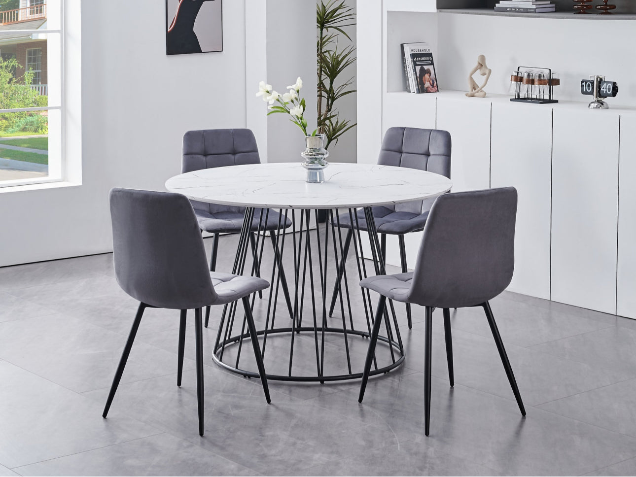 5 Piece White Marble Veneer Top With Black Pedestal Steel Base
Chairs: Soft Grey Velvet with Cross Stitching Details Black Steel Legs
Dimensions
Table: 48"Round 30"H
Chairs: 22"L 18"W 34"H