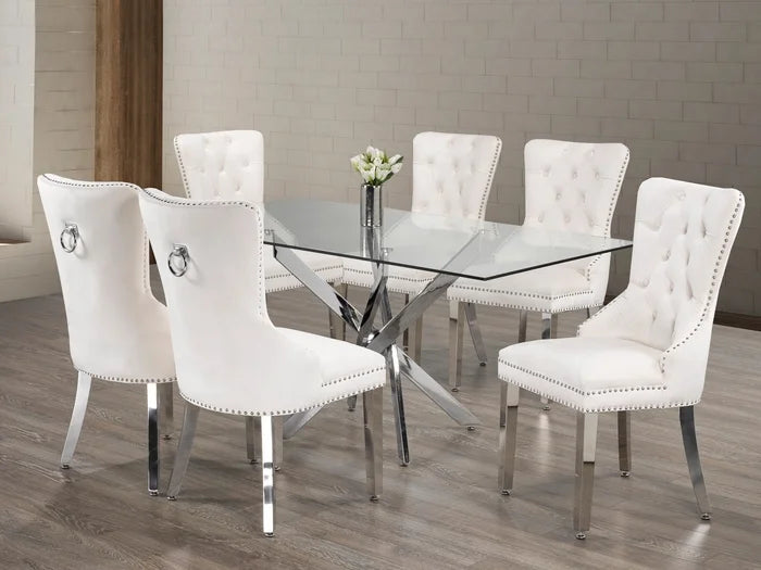 7-Piece Glass Table With Swiveled Chrome Legs and Creme Velvet Dining Chairs with Chrome Knocker